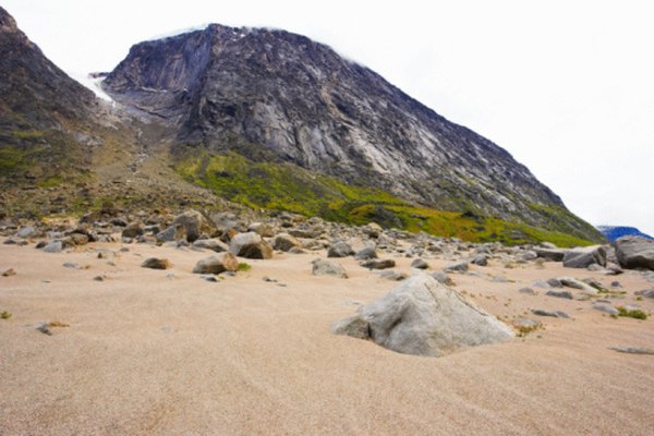 When glaciers melt, they drop the rocks and other sediments they are carrying into the landscape.