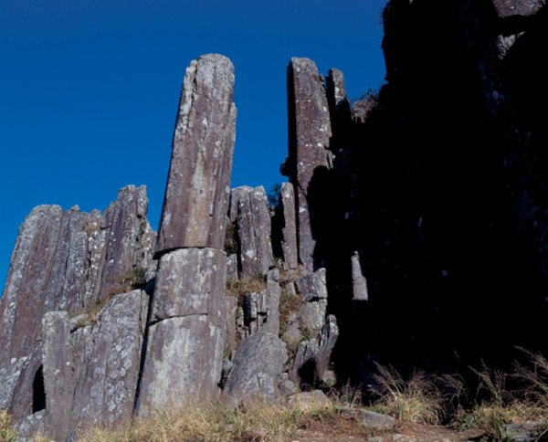 Photo Credit: Hemera Technologies/Photos.com/Getty Images Basalt flooded from volcanic vents cools in columnar formations.