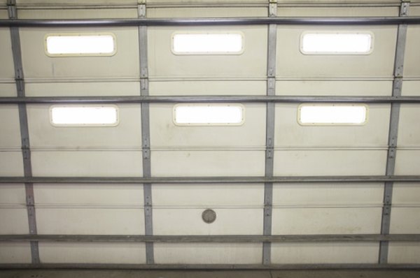 How To Adjust The Spring Tension On An Overhead Door