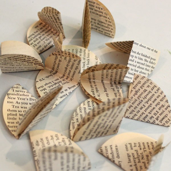 Dobre os círculos de papel em quartos