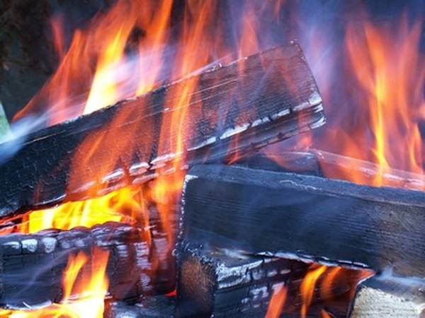 Photo Credit: firewood image by Igors Leonovs from <a href='http://www.fotolia.com'>Fotolia.com</a> Imperfect wood can make ideal firewood.