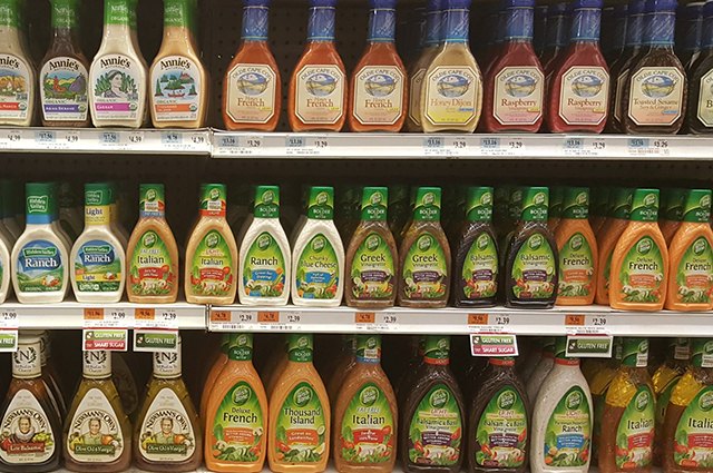 An image of dressing on store shelves.