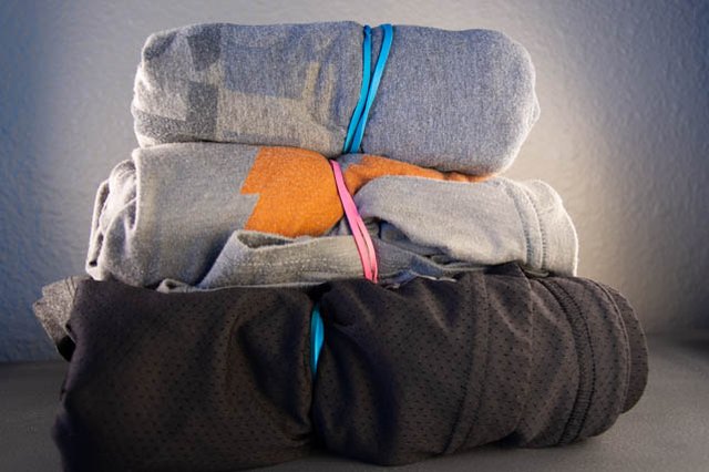 A pyramid of clothes packing hack and rubber band hack