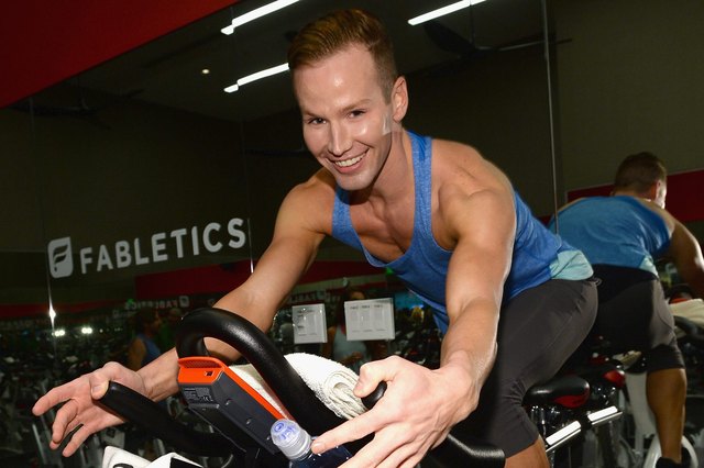 celebrity fitness trainer Jason Wimberly at a JustFab cycling event