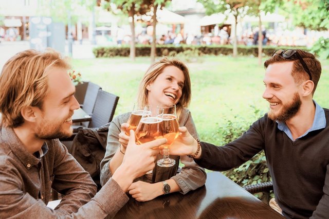 friends toasting with beer glasses