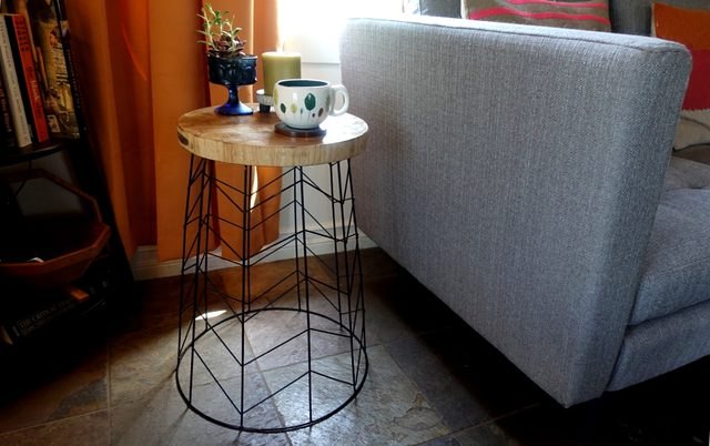 create a side table using a wire basket