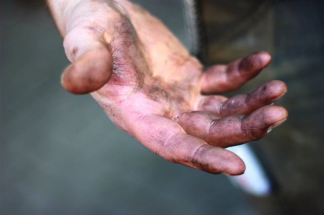 Dirty hands from a construction worker