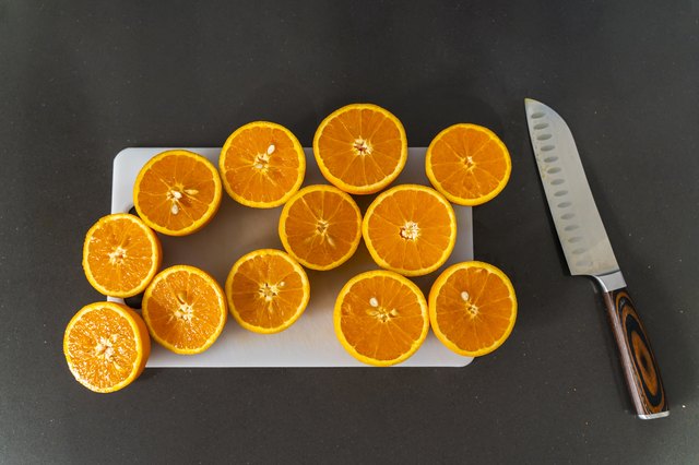 Many Orange Halves On Table