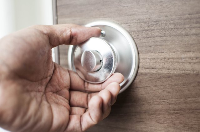 Holding a modern door knob