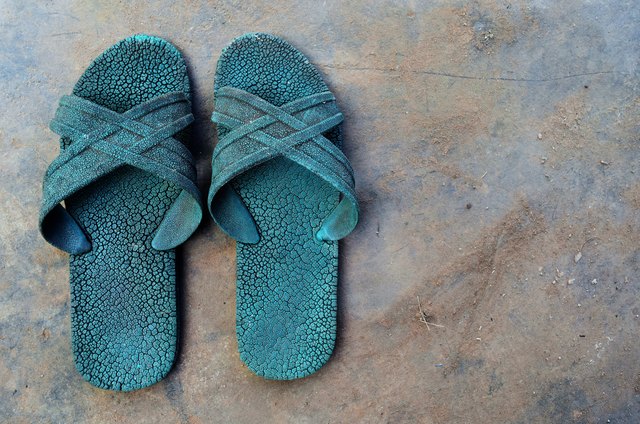 High Angle View Of Slippers On Floor