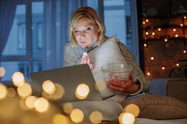 Woman eating healthy late night snacks
