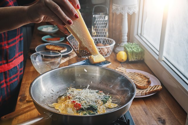 Preparing Spinach Egg Omelet with Chili and Parmesan