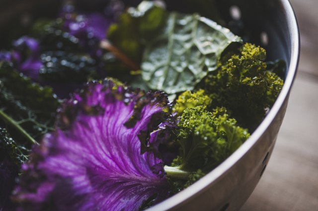 Close-up of chard and kale in colander