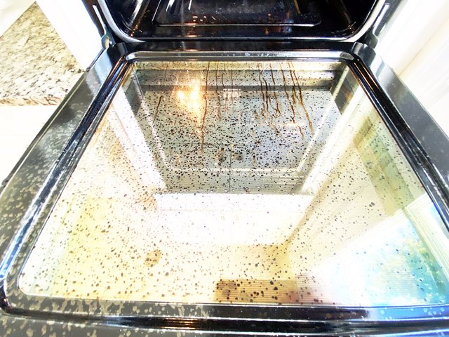 view of greasy oven door