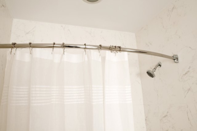 How to Keep a Shower Curtain Rod Up on Tile Walls | eHow