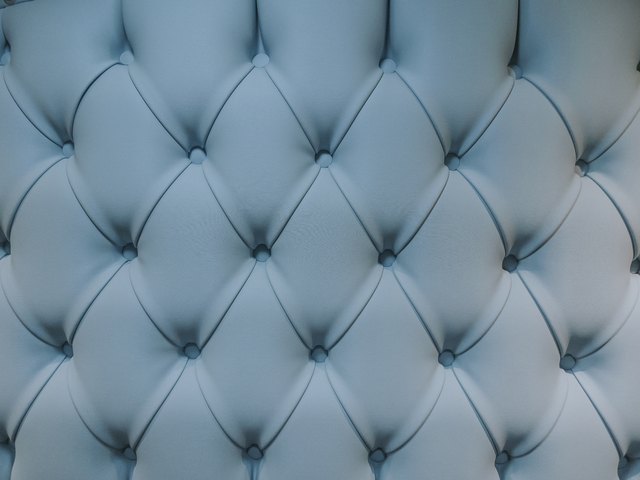 Teal blue capitone textile