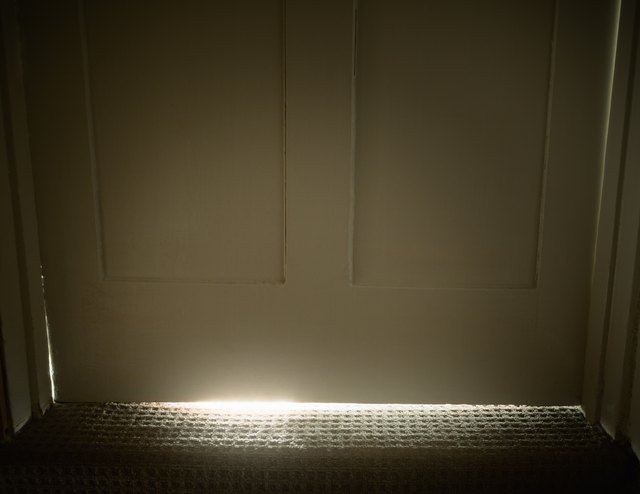 Light glowing from under door