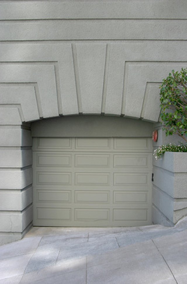 How To Seal A Garage Prevent Flooding Ehow Using Threshold Seals On The Bottom Of Garage Doors Will Keep Water Out