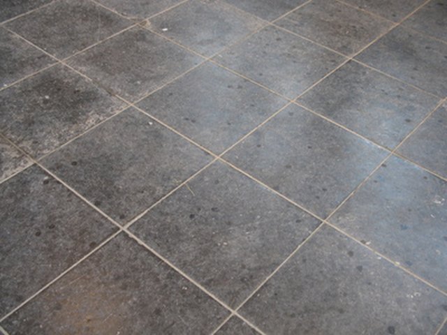 How To Tile Over Previously Stained Concrete Ehow Tiling Can Be Done Over Stained Concrete With Proper Preparation