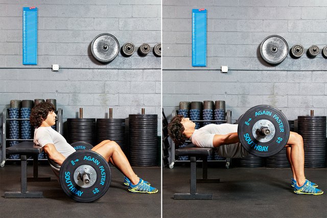 Muscular bodybuilder guy doing exercises with dumbbells