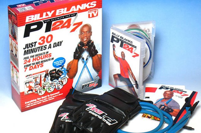 Portrait of man using exercise equipment in gymnasium