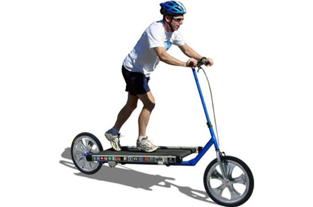 Portrait of man using exercise equipment in gymnasium