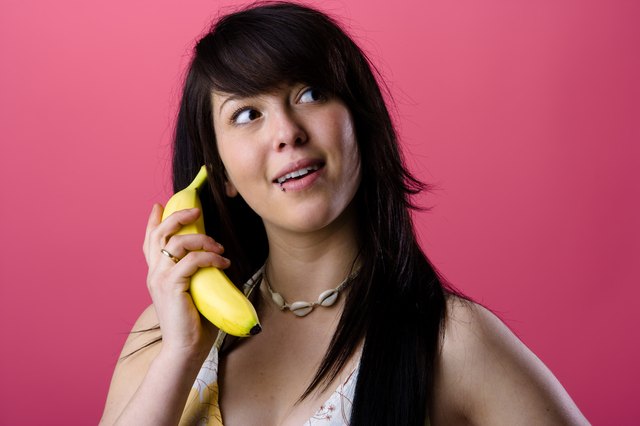 Woman holding banana