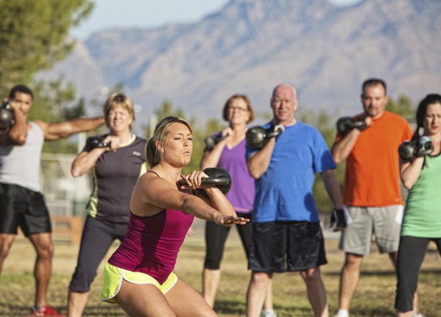 Mixed Group of People Exercising
