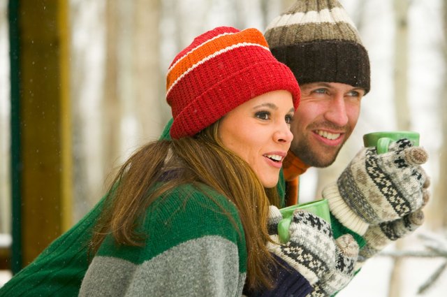 Couple with mugs of hot chocolate