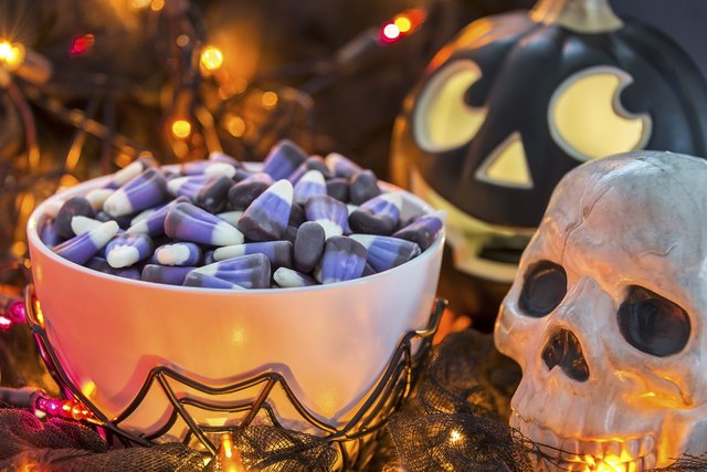 Purple candy corn in a spooky Halloween theme