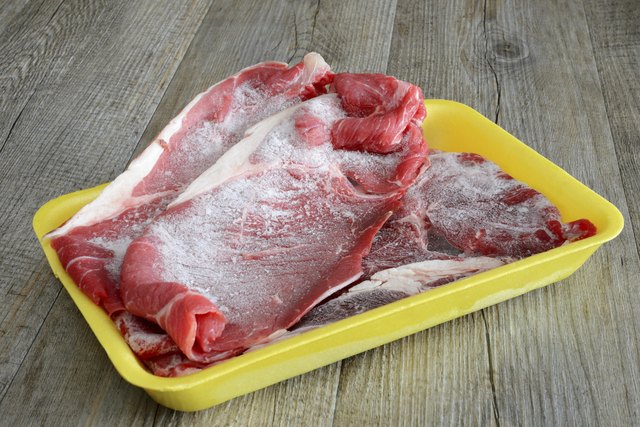 frozen steaks of meat
