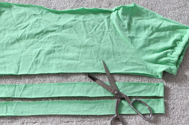 Cut two strips from the T-shirt.