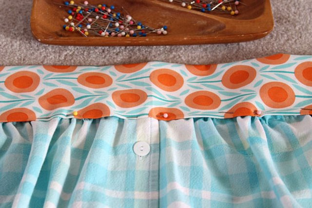 Pin the apron into the waistband.