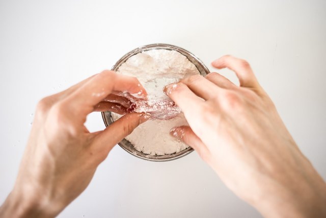 Coat the Turkish delight squares.