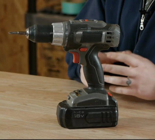 Man drilling with power tool