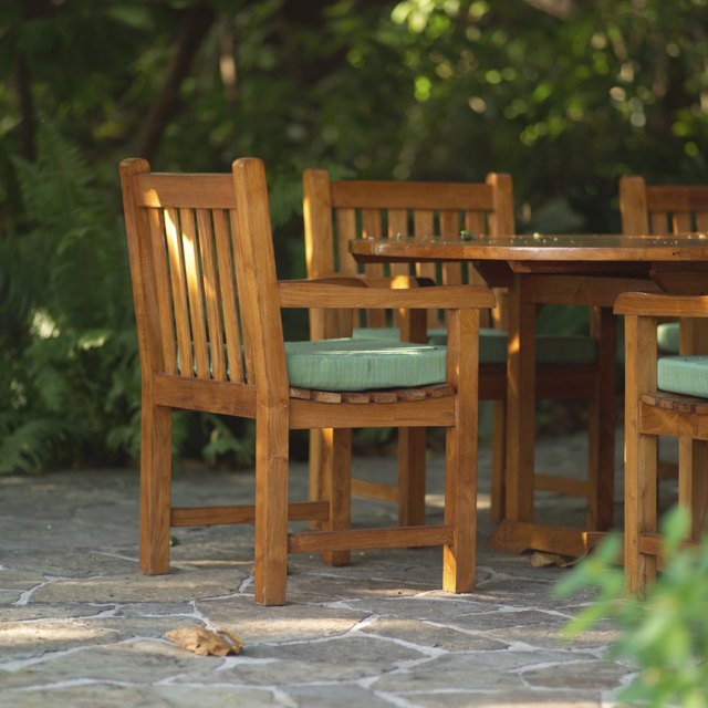 How To Care For Outdoor Wood Furniture Ehow Outdoor Furniture Can Be Stained Or Allowed To Gray