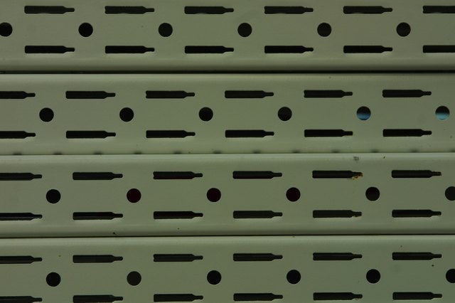 How To Attach Track Brackets Shelves Ehow Double Slot Tracks Allow You To Securely Attach Shelves The Brackets