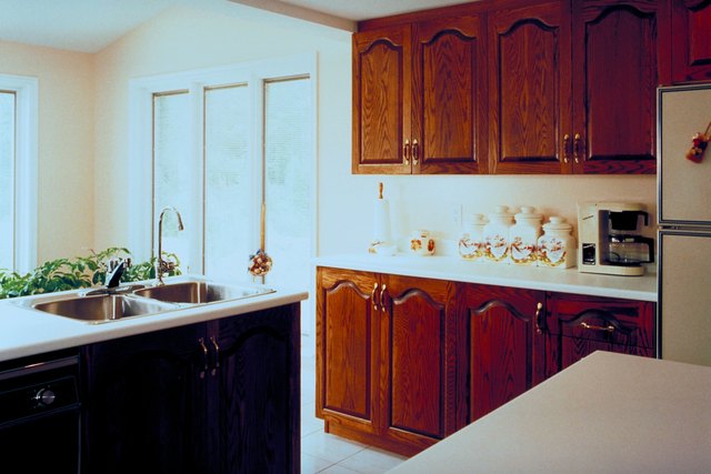 How To Cover A Refrigerator Door With Wood Ehow Add Wood To Your Refrigerator So It Matches The Cabinets