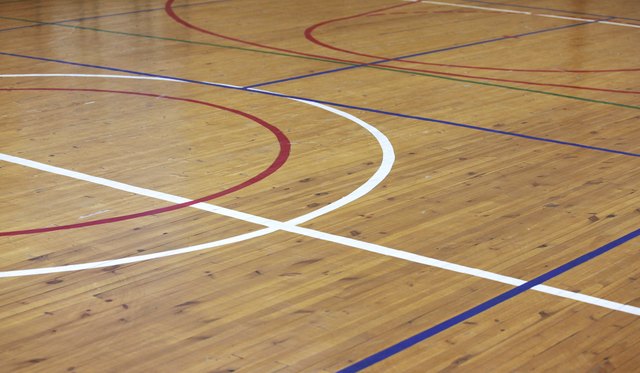 Satin Vs Semi Gloss Finish For A Floor Ehow The High Gloss Of A Gymnasium Floor May Not Be Right For Your Living Room
