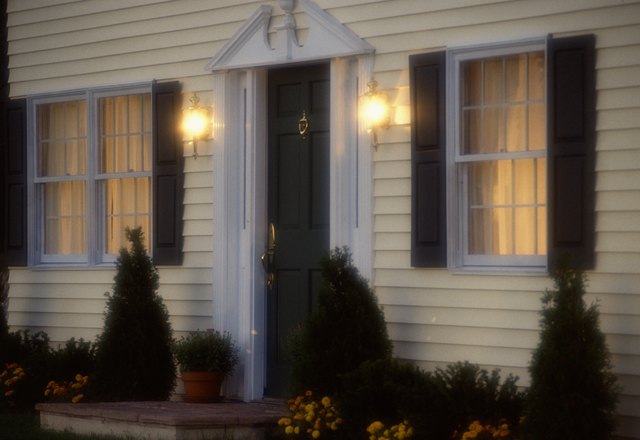 Installing Light Fixtures On Vinyl Siding Ehow Image Jupiterimages Photos Com Getty Images You May Like How To Install Ceiling Light Fixtures