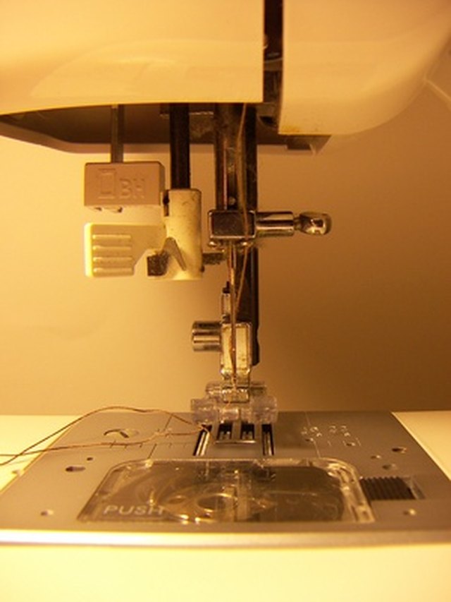 singer sewing machine repair boobin adjust