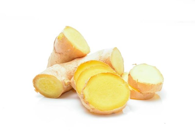 Fresh ginger on white background in studio
