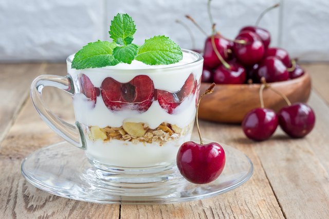 Cherry, muesli and yogurt dessert in glass, verrine, horizontal