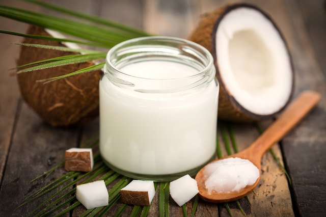 Coconut oil on the wooden table