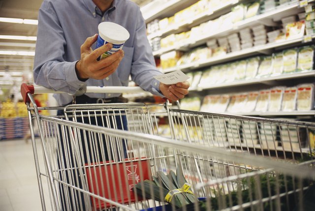 Man Holding Yogurt Pot