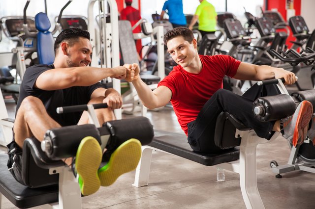 Bros working out together in a gym
