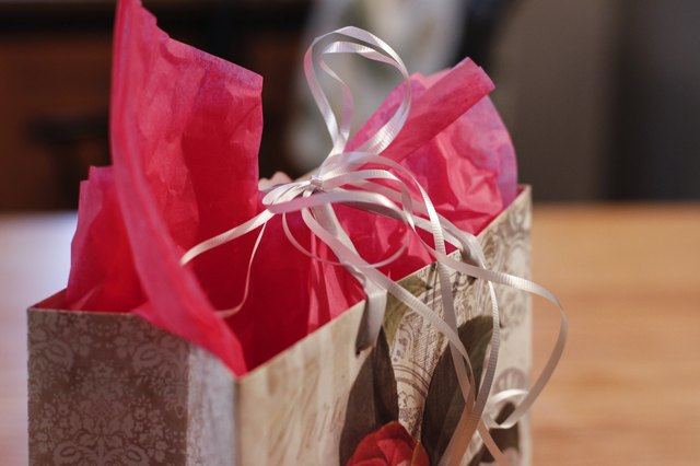 How to Put Tissue Paper in a Gift Bag | eHow