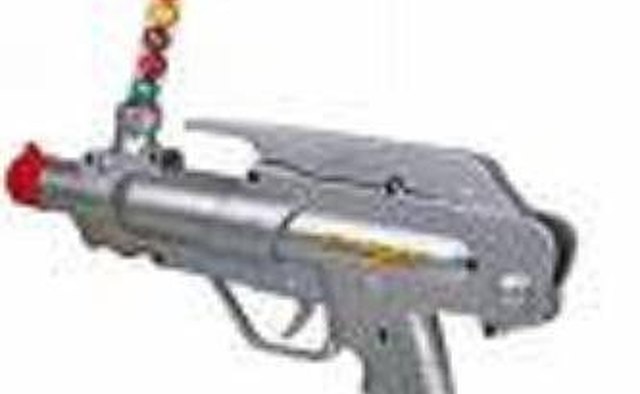 Paintballs loaded into a paintball gun.