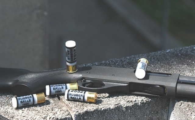 Long-barreled shotgun.