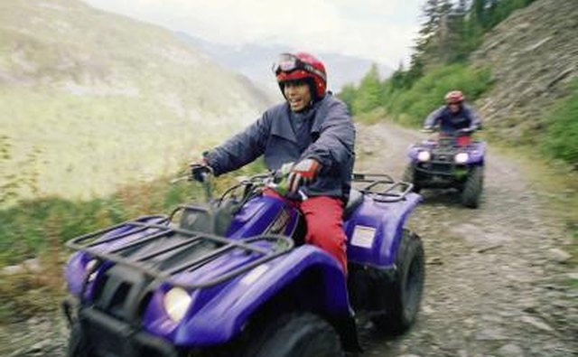 Friends riding ATVs